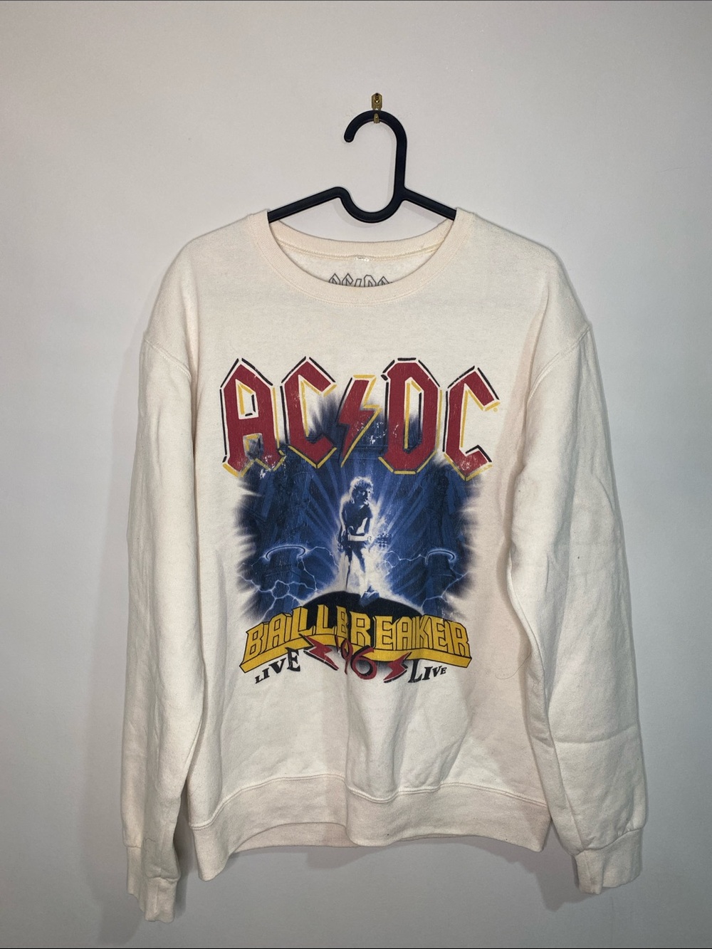 AC/DC Off-White Crewneck Sweatshirt with Red and Yellow Logo